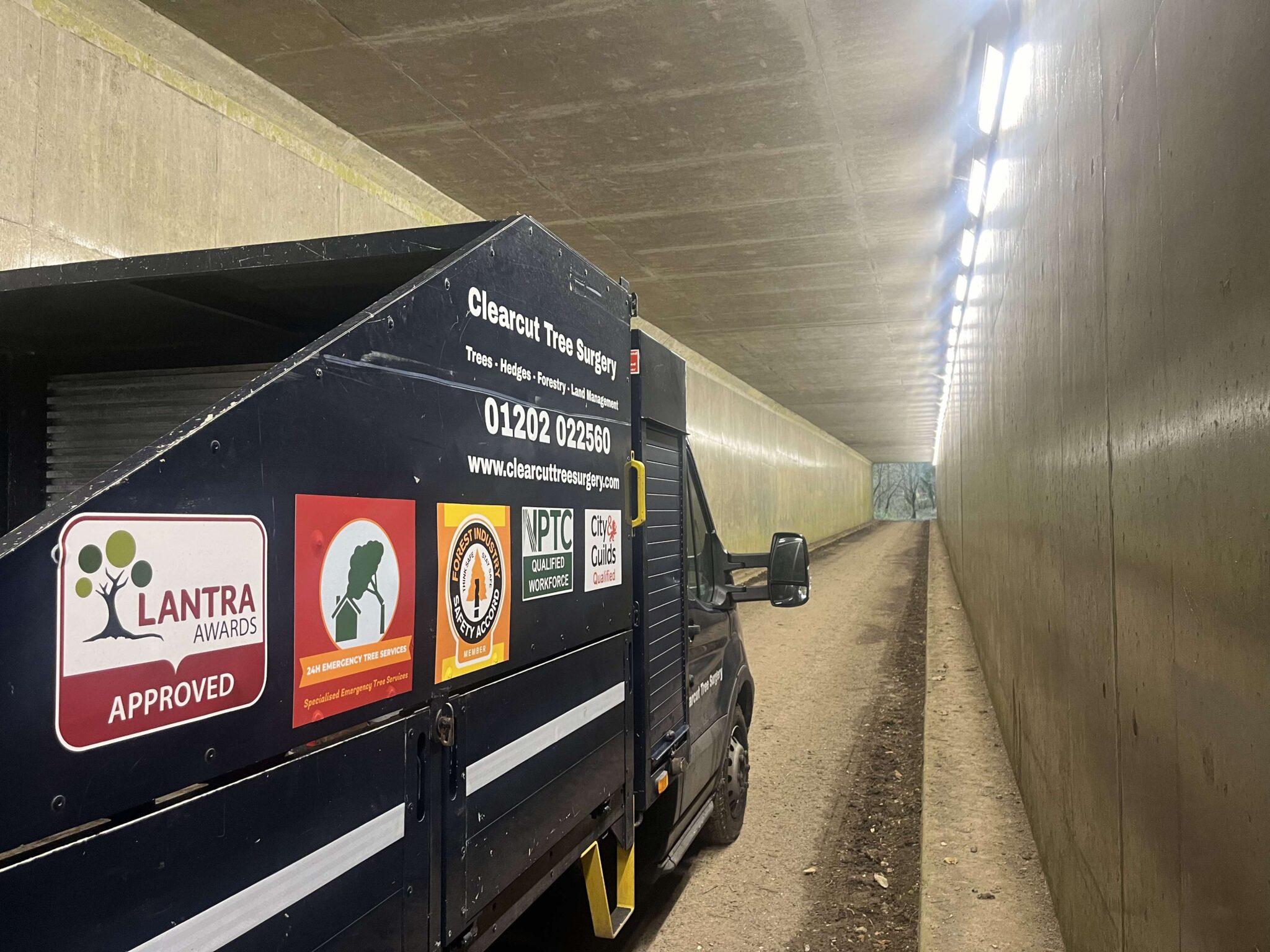 The side of the Clearcut van with its qualification badges